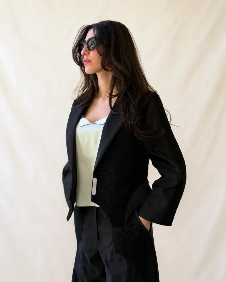 Mid-shot of the Shabaq Taffeta Jacket and Trousers focusing on the textured fabric, sharp collar, and light underlayer