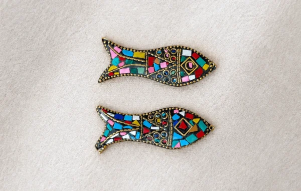 Two fish-shaped decorative pieces with colored stone mosaic and enamel inlay on metal, Iranian handicraft