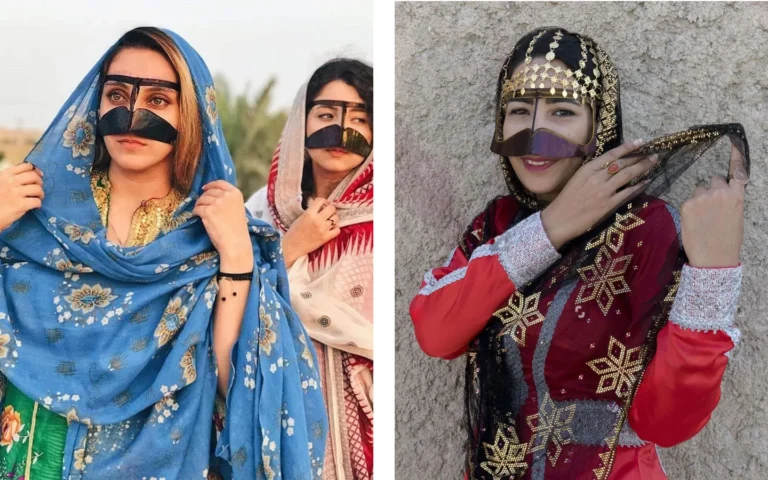 Two photographs of Iranian women in traditional Bandari dress from Hormozgan province, southern Iran: on the left, a woman in a blue floral headscarf and gold-embroidered green gown wearing the black burqa’ face mask; on the right, a smiling woman in a red embroidered gown with gold star motifs, a gold coin headdress, and a dark purple burqa’ face mask, reflecting the region’s blend of Persian and Arabian Peninsula influences.